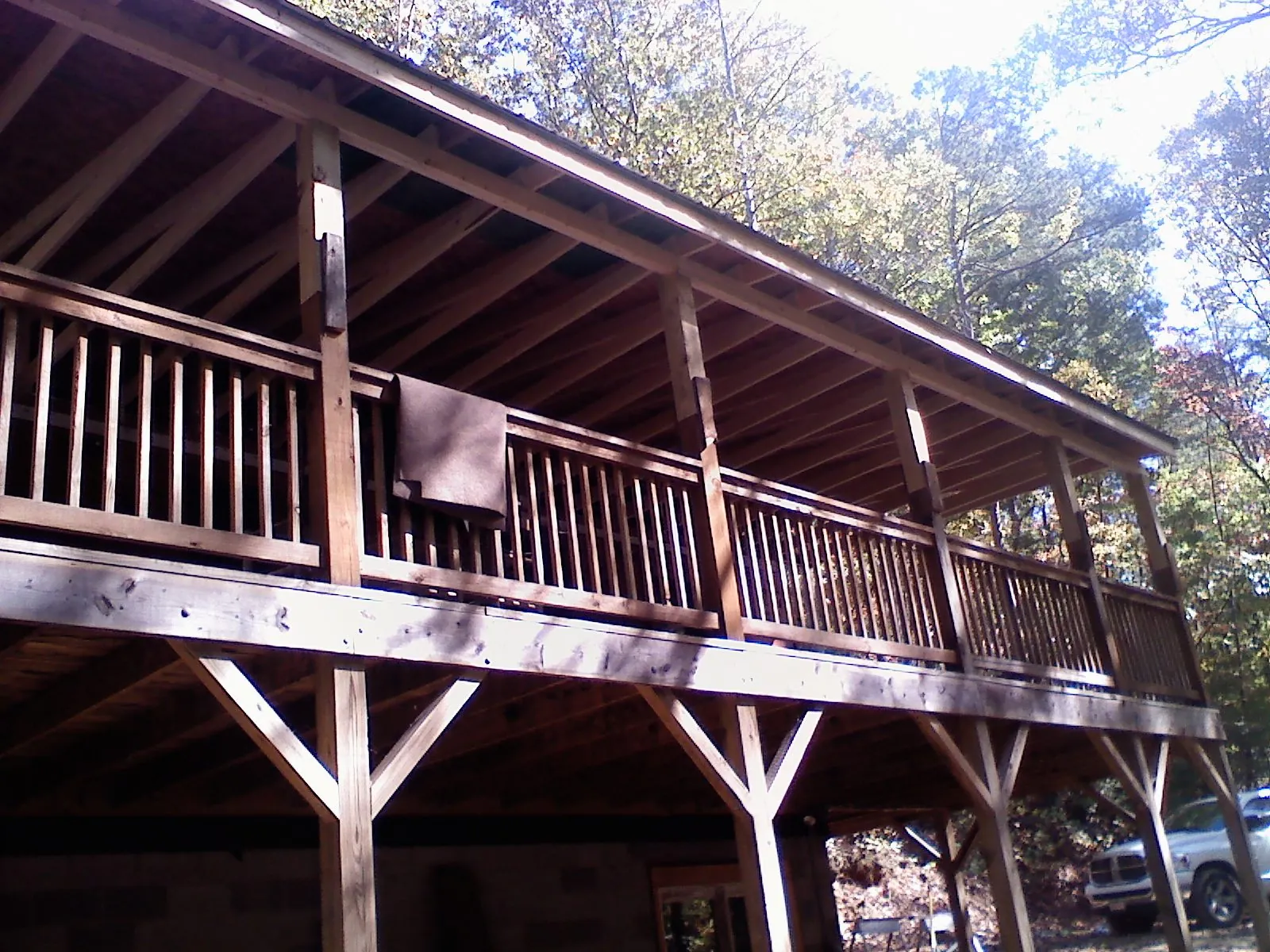 Timber framing under a new elevated porch and deck — Roof Leak Repair in Milliken by Roofing Brothers